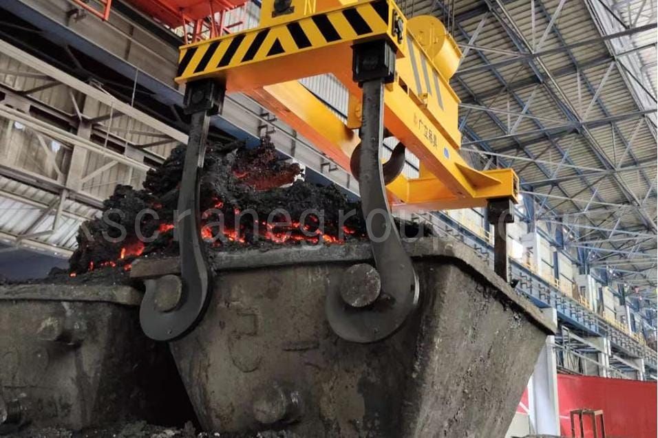 A beam with four crane J hooks for lifting slag pots