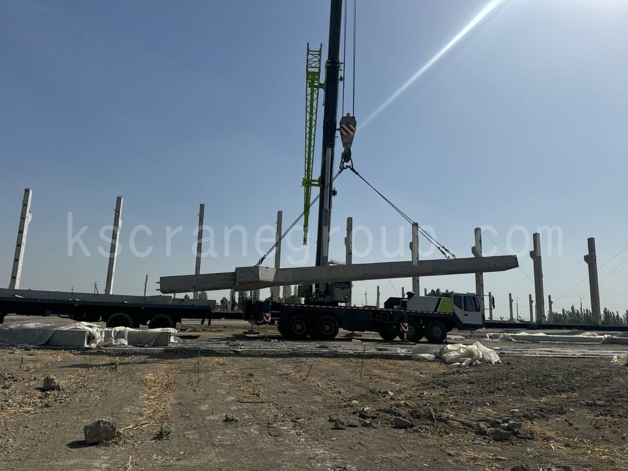 uzbekistan glass factory concrete beam installation